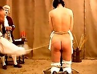 Innocent girl tied naked to the whipping post - searing cane strokes - deep red stripes